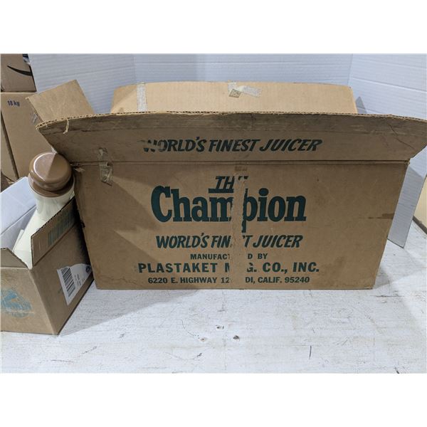 Vintage Champion juicer with extra pieces, in original box