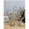 Image 3 : Vintage avon perfume bottles, bells, clocks, and phones