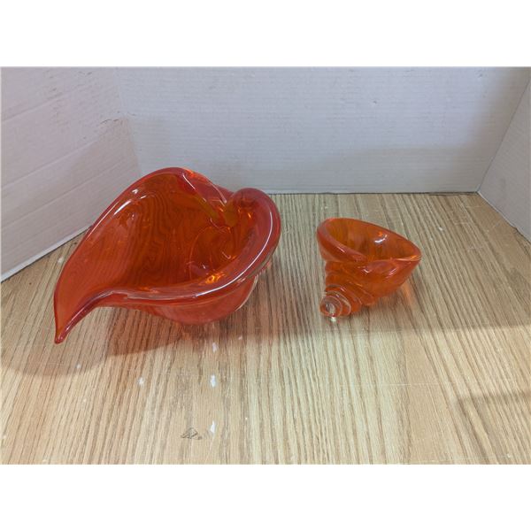 2 orange blown glass shells