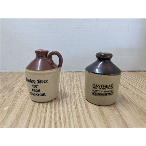2 mini liquor jugs
