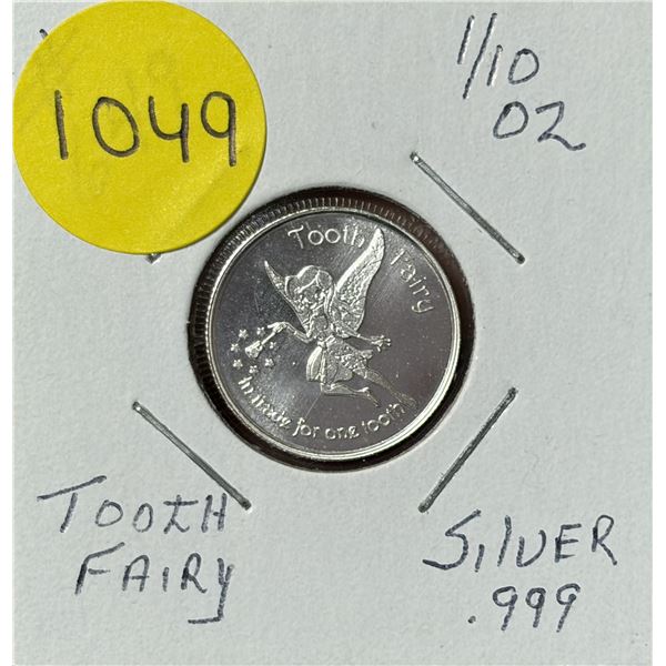 This is a 1/10 troy oz .999 fine silver "A Visit from the Tooth Fairy" commemorative round minted by