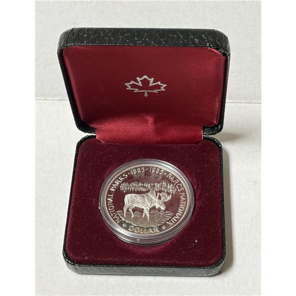 1985 Canada National Parks Centennial Silver Dollar, issued by the Royal Canadian Mint. It celebrate