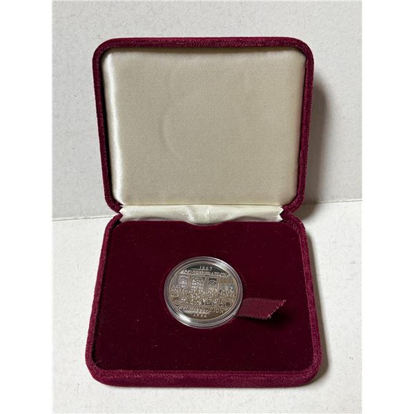 1982 Canadian Constitution Commemorative Dollar presented in a Royal Canadian Mint burgundy display 