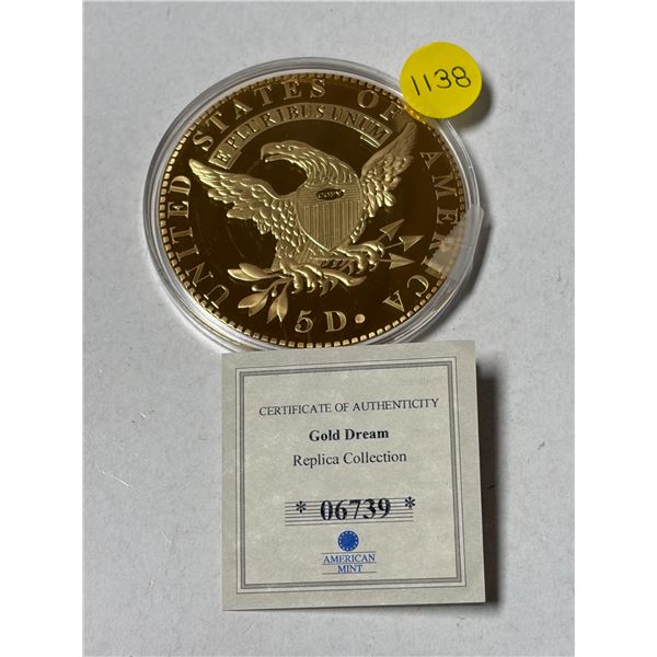 Replica gold-layered or commemorative token from the American Mint "Gold Dream Replica Collection.