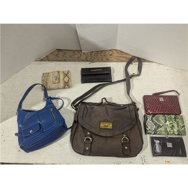2 purses with 5 ladies wallets