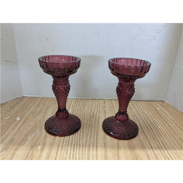 2 red glass candle holders