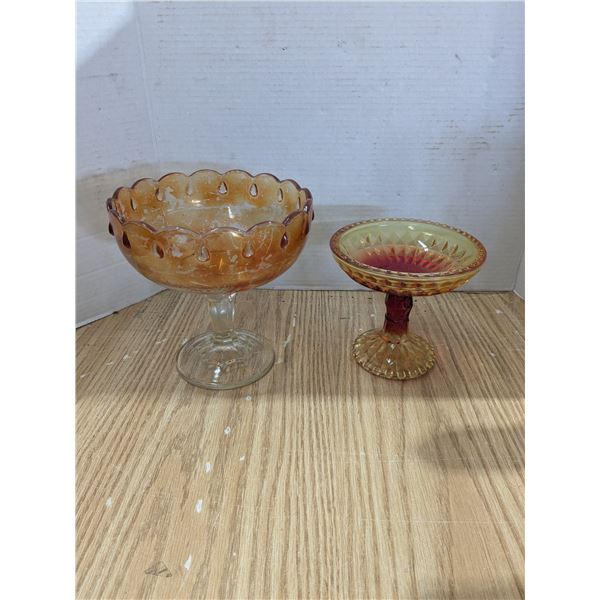 2 orange glass bowls