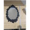 Image 2 : Oval mirror with cast iron frame, 17x12"