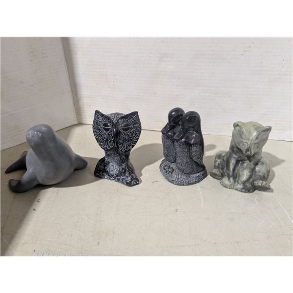 4 reproduction stone carvings - owl, loons, bear, seal