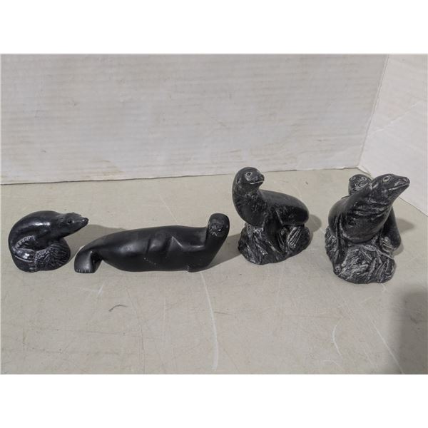 4 stone carvings - seals