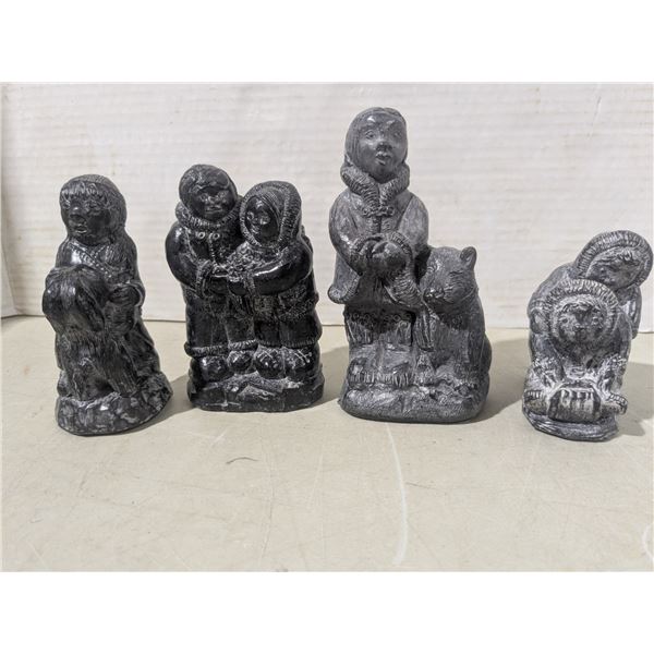 4 stone carvings - eskimos