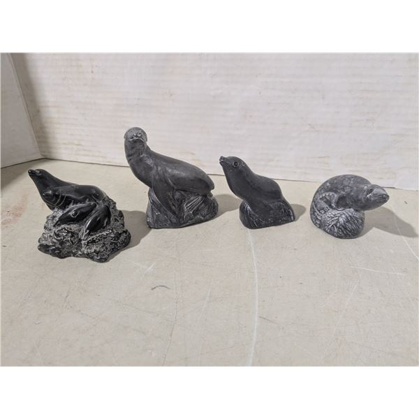 4 stone carvings - seals