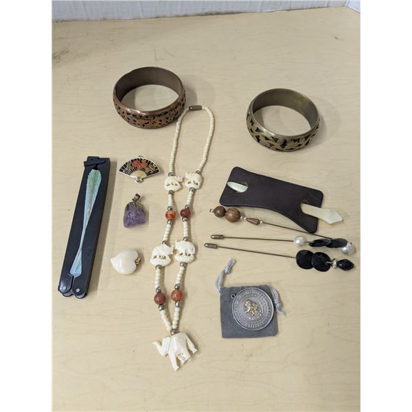 Mixed jewellery lot, copper bracelets, pendants, etc