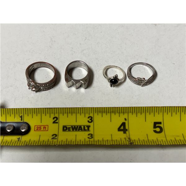 Lot of 4 Rings. (Sizes are 5, 6, 9, 11)