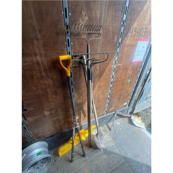 Assorted Garden Tools: Rakes and Shovels
