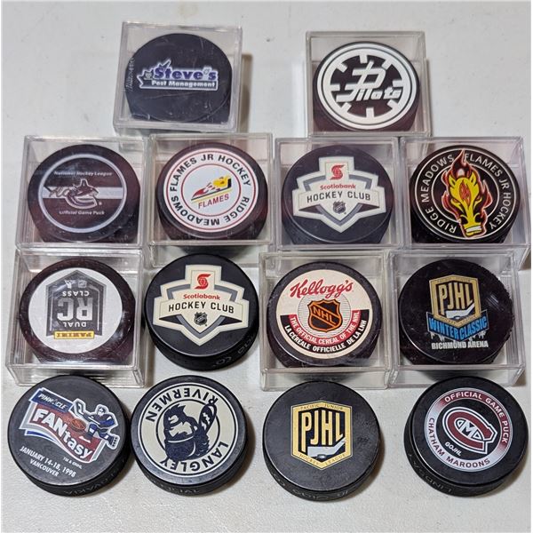 Assorted Hockey Team Logo Pucks