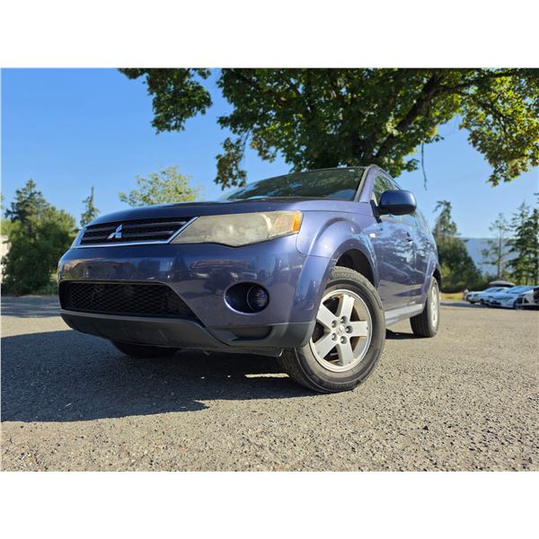 DUNCAN - 2009 MITSUBISHI OUTLANDER BLUE 249984 KMS - 602856-1