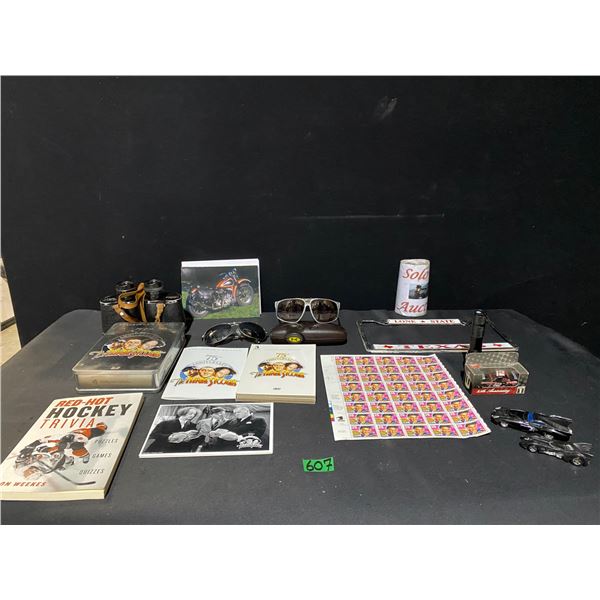 Elvis stamp collection, 3 Stooges DVD set, Batman cars, binoculars, sunglasses and more