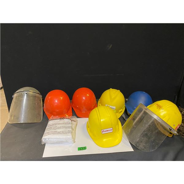 Lot of hardhats and safety visors