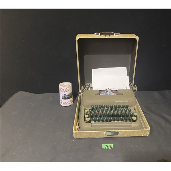 Smith Corona typewriter with carrying case