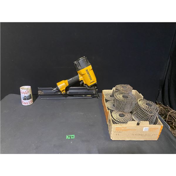 Bostitch brand nail gun with box of nails
