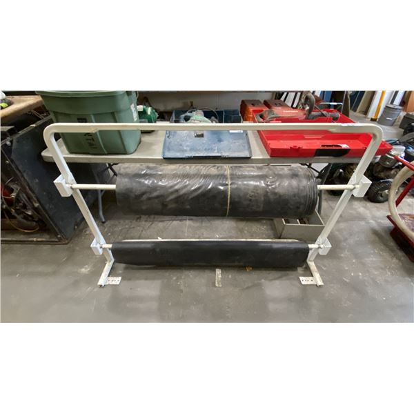 WHITE DUAL ROLL MATERIAL STAND WITH A PARTIAL ROLL OF LUMBER WRAP & LARGE ROLL OF BLACK POLY WRAP