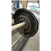 Image 4 : WHITE DUAL ROLL MATERIAL STAND WITH A PARTIAL ROLL OF LUMBER WRAP & LARGE ROLL OF BLACK POLY WRAP