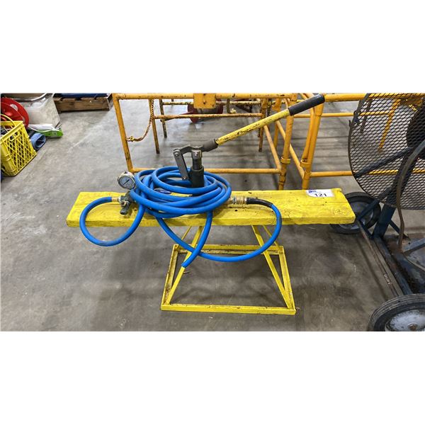 HYDRAULIC HAND PUMP ON YELLOW STAND