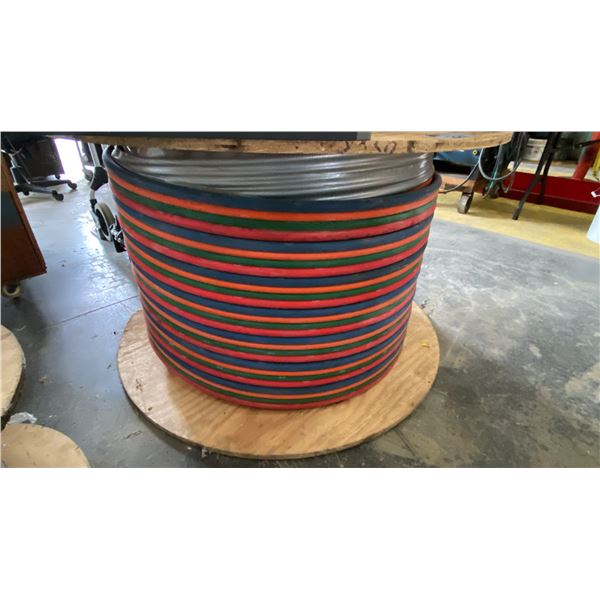 LARGE SPOOL OF GROUT QUAD HOSE APPROX 400'L