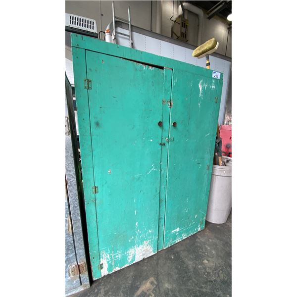 GREEN WOODEN STORAGE CABINET WITH ASSORTED MOSTLY AUTOMOTIVE CONTENTS INCLUDING WIRE, SPARK PLUGS,