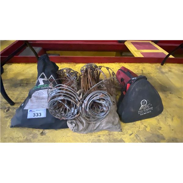 GROUP OF ASSORTED TIRE CHAINS, JUMPER CABLES & FIRST AID KIT