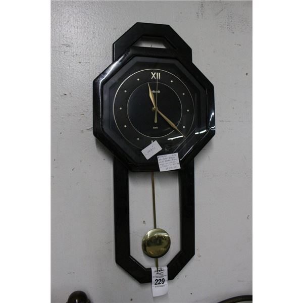Salton Contemporary Black Pendulum Wall Clock
