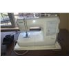 Image 2 : Kenmore 385.17627 Sewing Machine with Table and Accessories