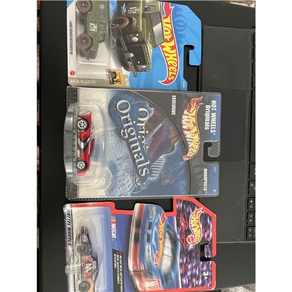 Lot of 3 Sealed Hot Wheels Collectibles – Land Rover, Monoposto & NASCAR