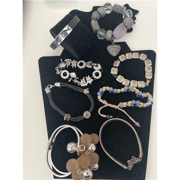 Lot of 9 Fashion Bracelets – Puma, Charm, Bangle & Beaded Styles
