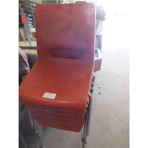 7 Red Plastic Chairs
