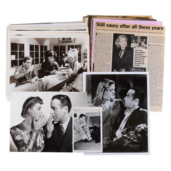A Collection of Humphrey Bogart Photographs and Clippings.