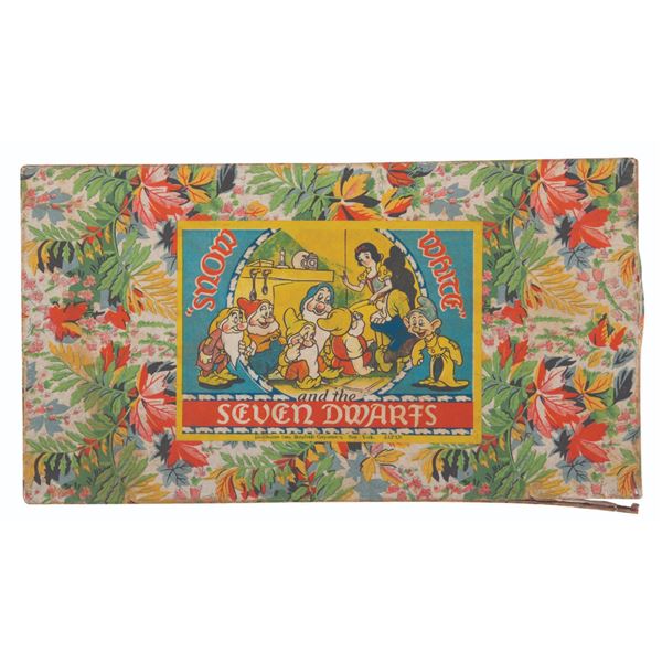 A “Snow White and the Seven Dwarfs” Bisque Figure Set.