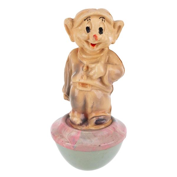 A “Snow White and the Seven Dwarfs" Dopey Wobble Toy.