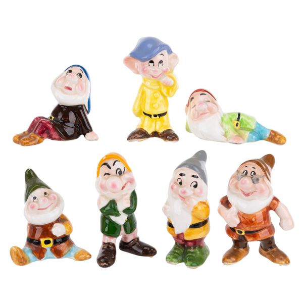 A Set of "Snow White" Dwarfs Ceramic Figures.