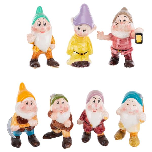 A "Snow White and the Seven Dwarfs" Ceramic Figurine Set.
