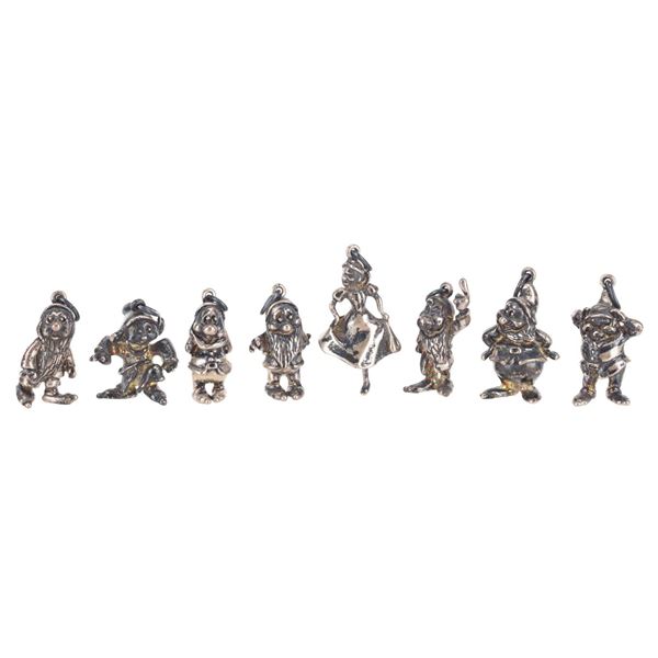 A Set of Sterling Silver "Snow White and the Seven Dwarfs" Charms.