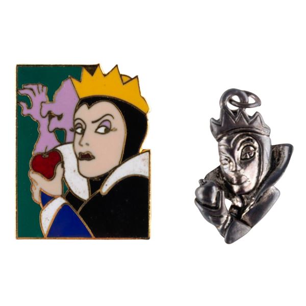 A "Snow White" Evil Queen Pin and Silver Charm.
