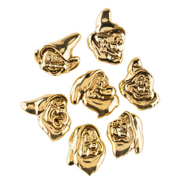 A Set of Gold "Snow White" Dwarf Pins.