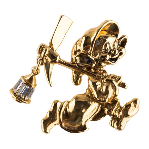 A "Snow White" Dopey Lapel Pin.