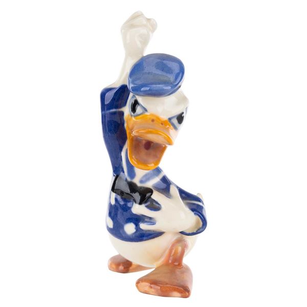 A 1940s Donald Duck Ceramic Figurine.