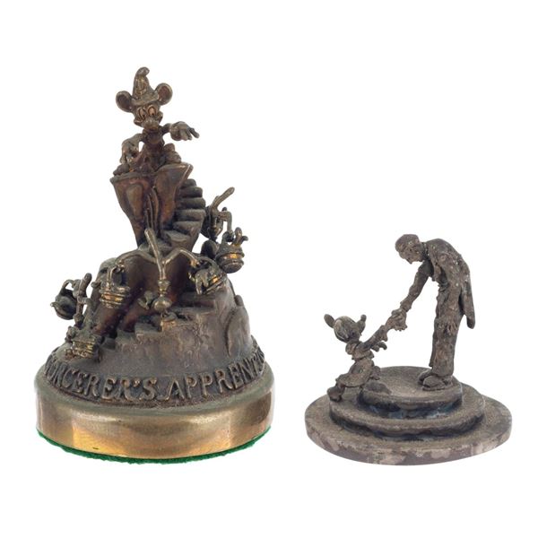 A Pair of Miniature "Fantasia" Bronze and Silver Statues.
