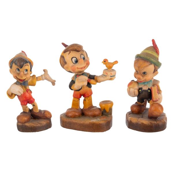 Three Miniature "Pinocchio" Figurines by ANRI.