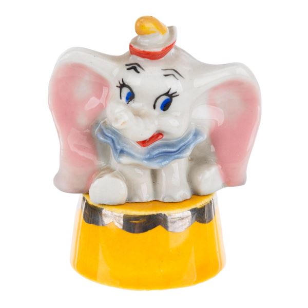 A "Dumbo" Ceramic Figure with Pedestal.