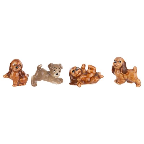 A Set of "Lady and the Tramp" Ceramic Puppy Figurines.